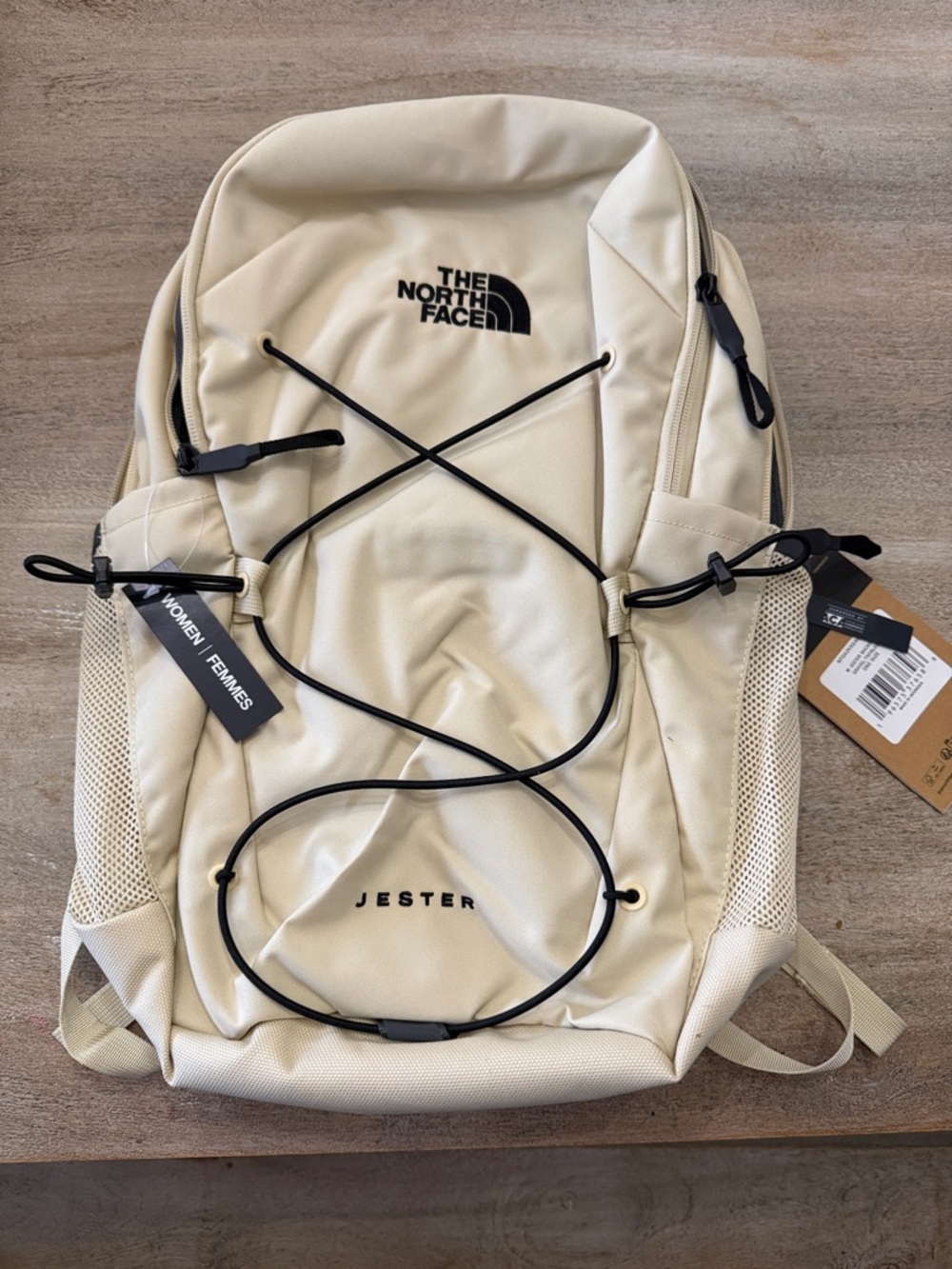 The North Face Jester Backpack in Cream with Black Bungee